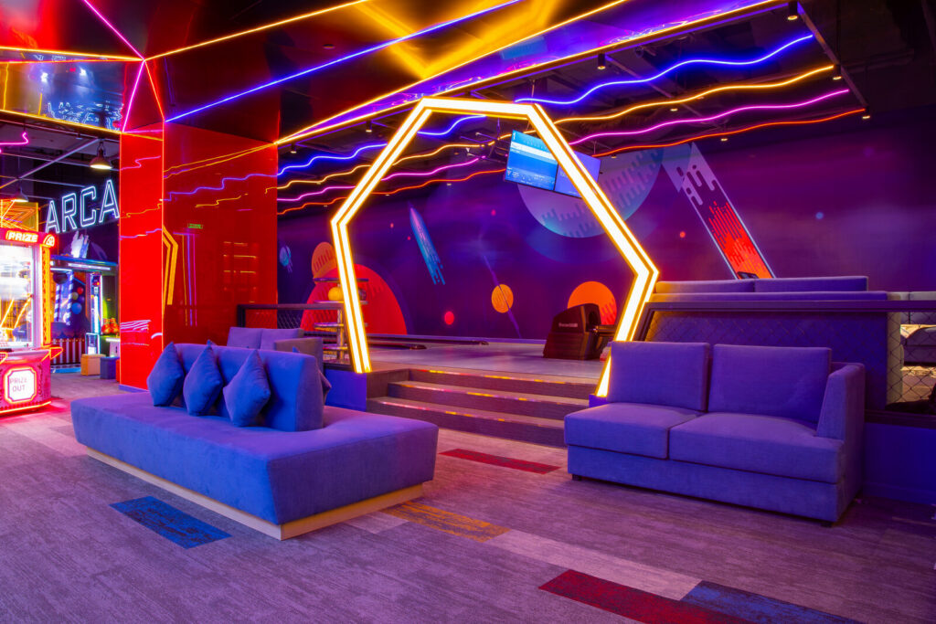 Lounge settees and raised seating behind the bowling approach